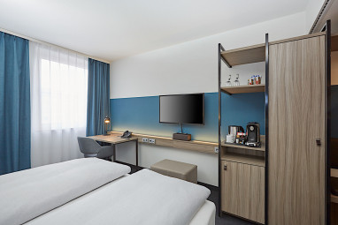 H4 Hotel Leipzig: Habitación